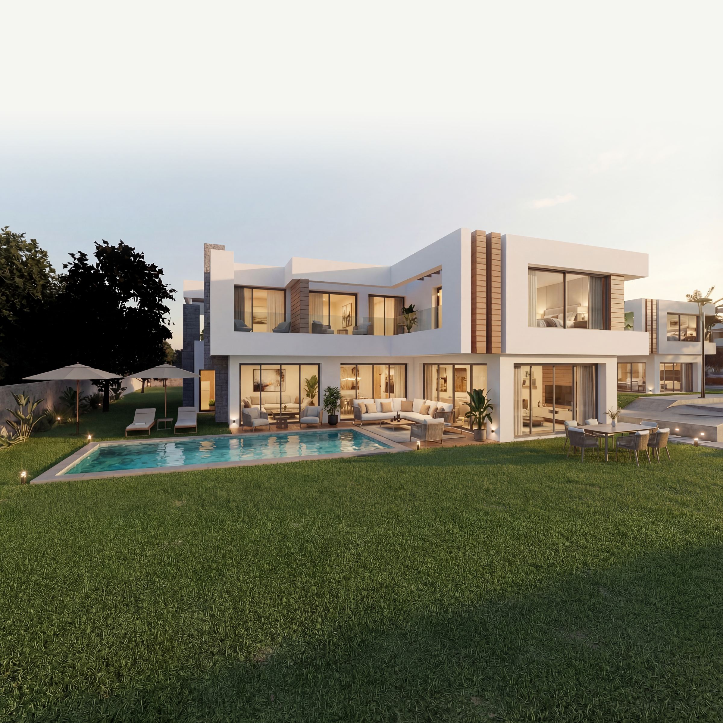 Villa Eleven Park au crépuscule, sa piscine et son jardin, route des Zaers