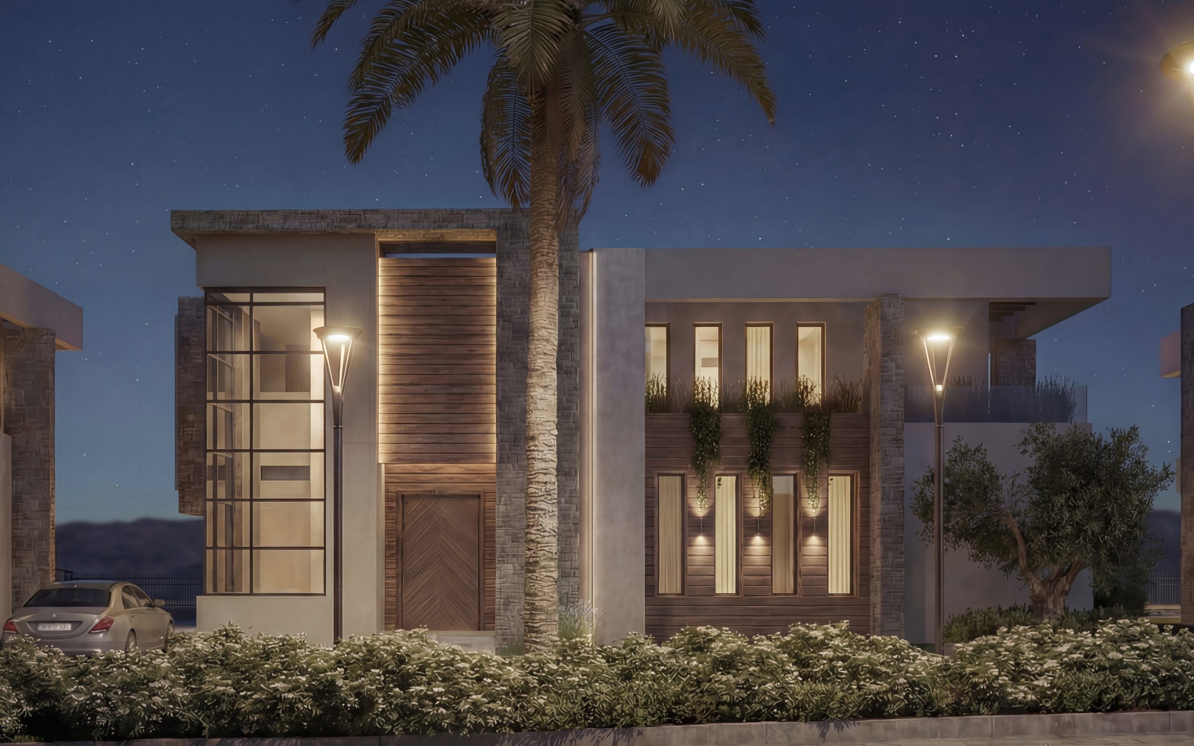 Façade d’une villa principale d’Eleven Park, de nuit, route des Zaers, El Menzeh