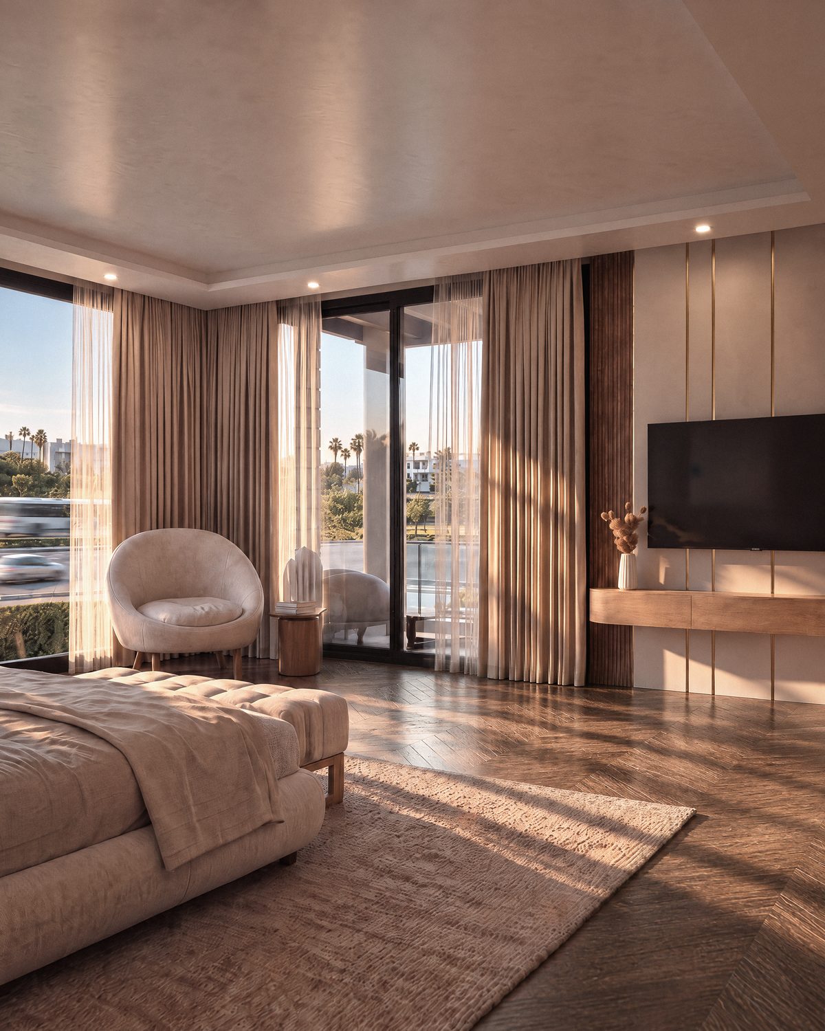 Chambre de la suite parentale d’une villa Eleven Park, grande baie sur le jardin